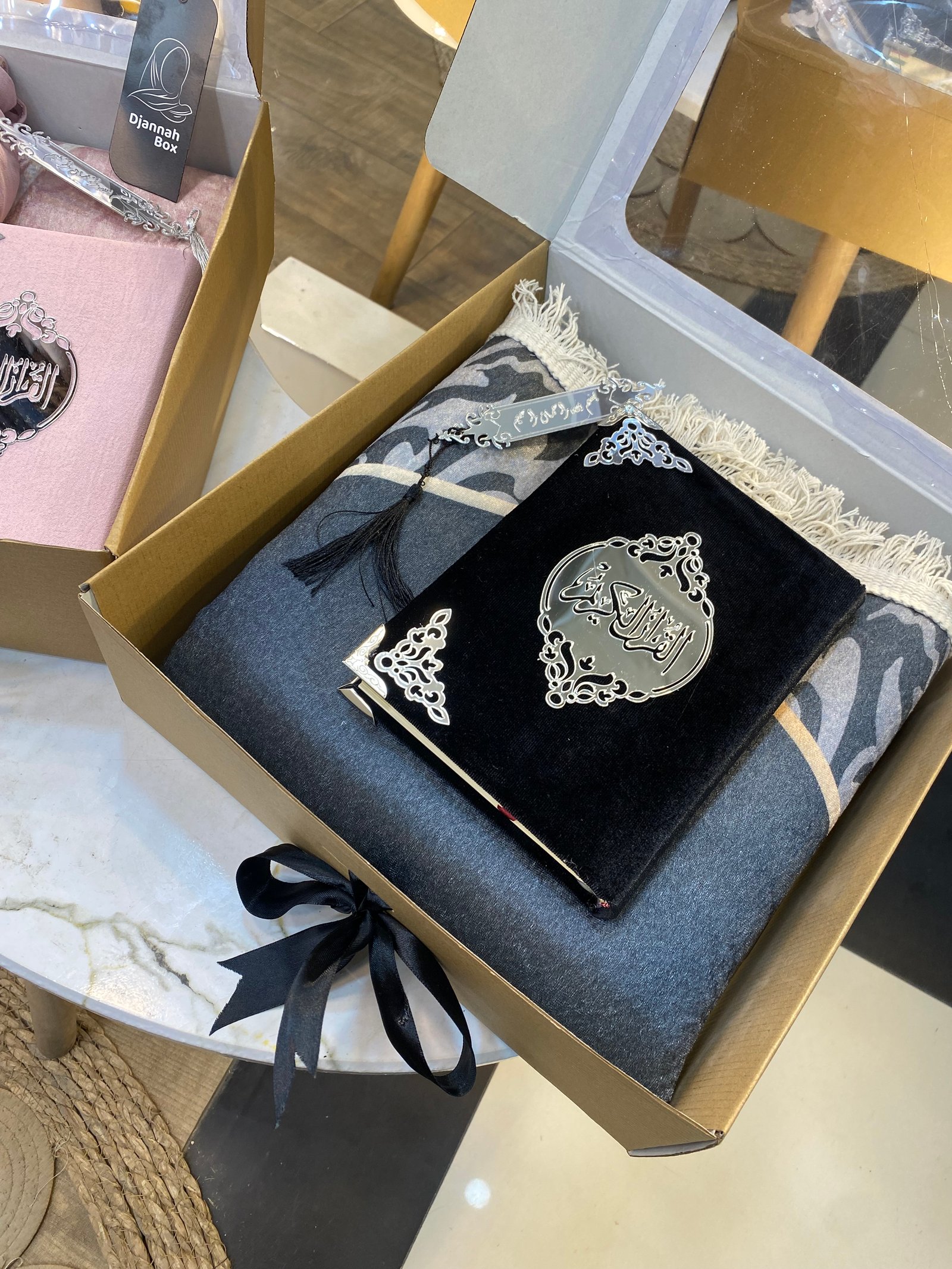 بوكس رجالي اسود : مصحف سجادة فاصلة